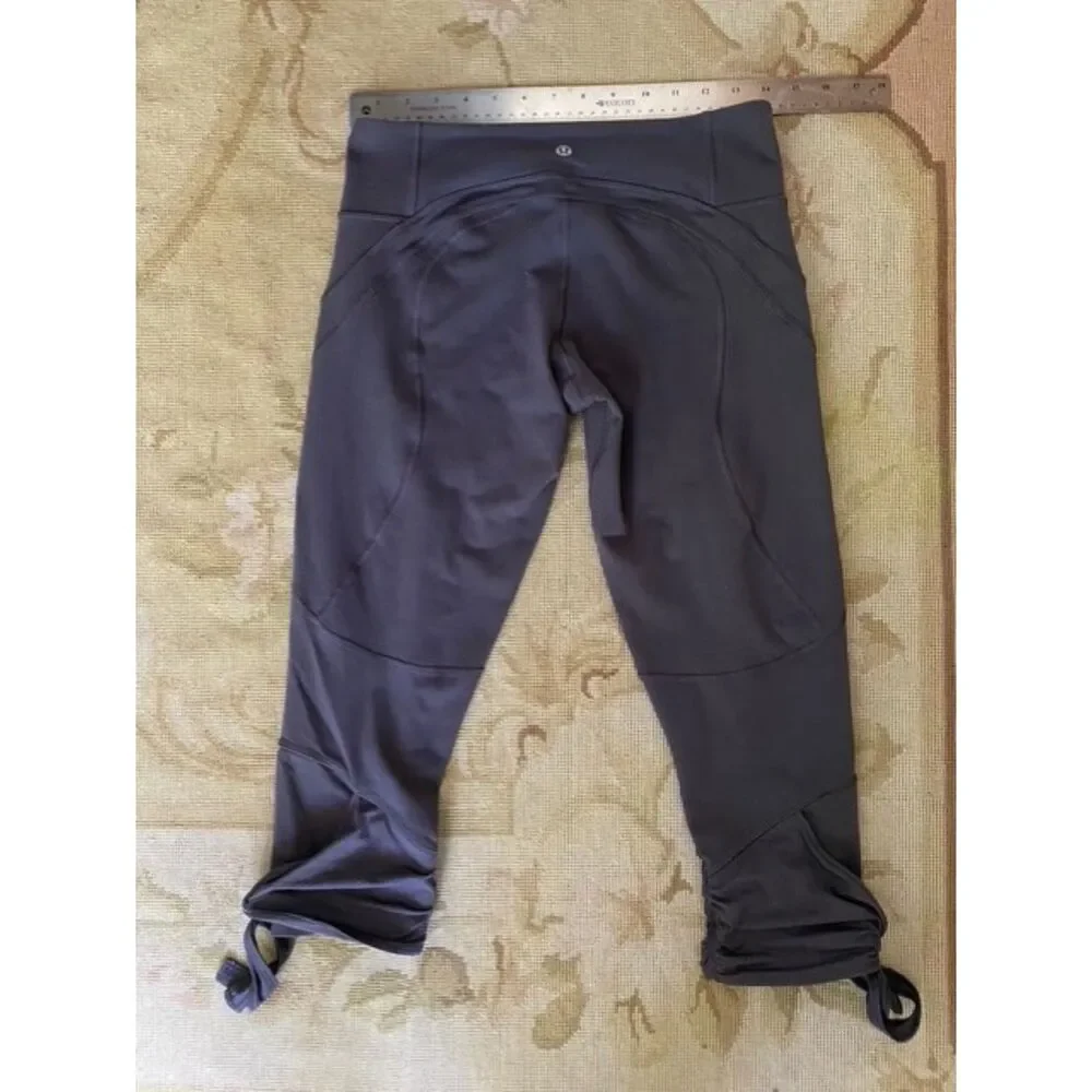 EUC Lululemon Swift Speed / Speed Up Coal Grey Side Tie Cropped Pants 8